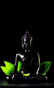 Ceramic dark figurine photo