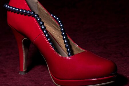 Women's shoes red high heeled shoe photo