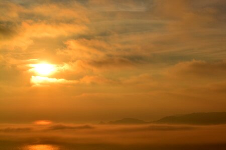 Sunrise clouds fog photo