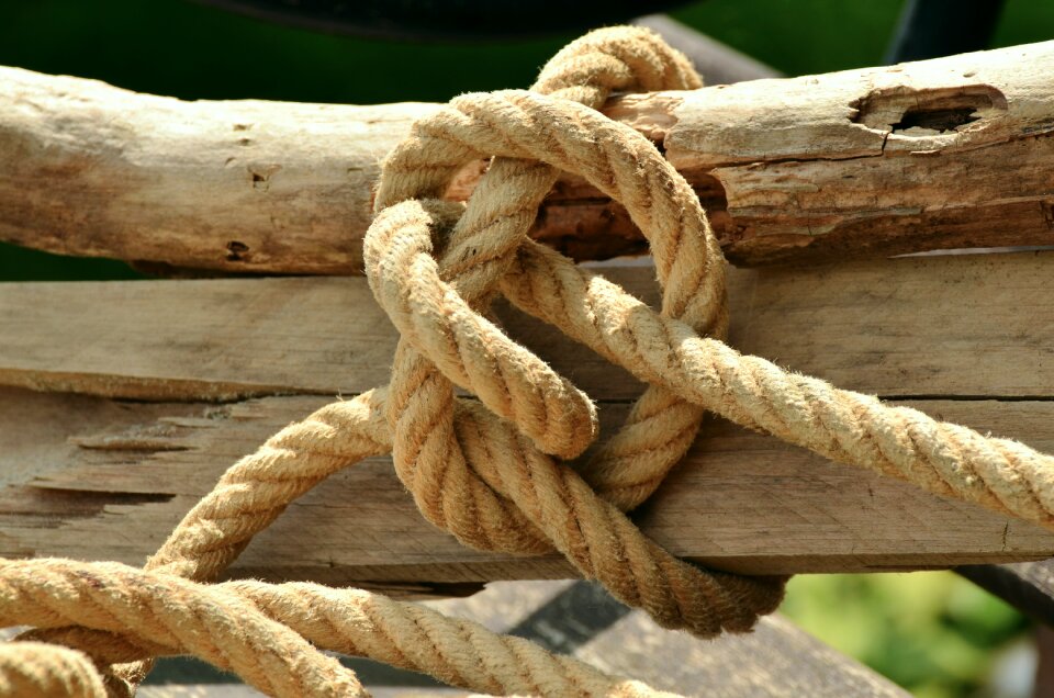 Natural rope woven knot