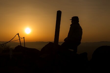 Silhouette summit sun