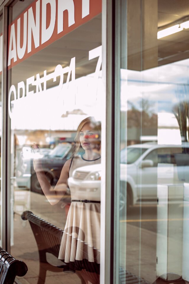 Woman window brown thinking