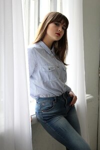 Girl the light from the window beautiful
