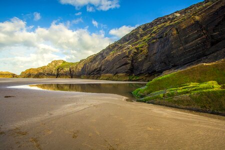 Low tide cave cardigan bay photo