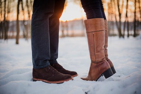 Boots snow sunset