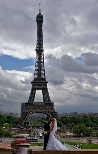 Eiffel tower bride and groom clouds photo