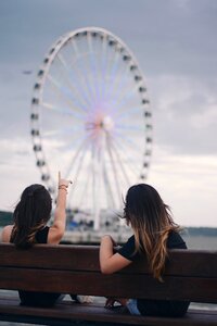 People pointing sitting photo