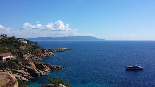 Rocks sea clouds photo