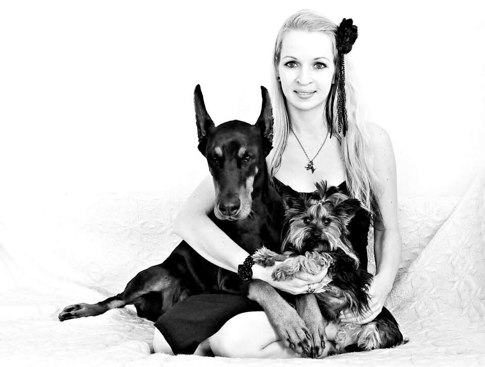 Doberman blonde girl hug photo