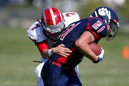 Tackle ball player photo