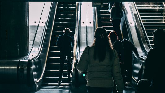 Escalator people walking