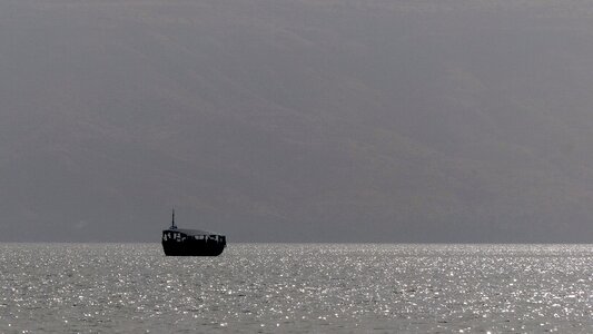 Lake tiberias dawn boat photo