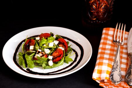 Salad rocket tomatoes photo