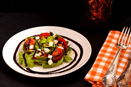 Salad rocket tomatoes photo