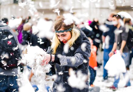 Woman playful feathers photo