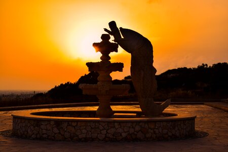 Sculpture sunset sunset colors photo