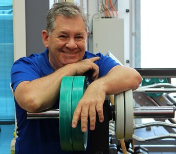 Old man trainer gym