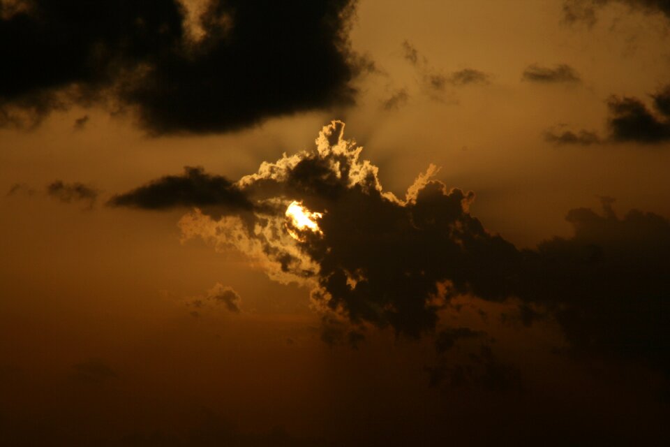 Sun clouds evening red
