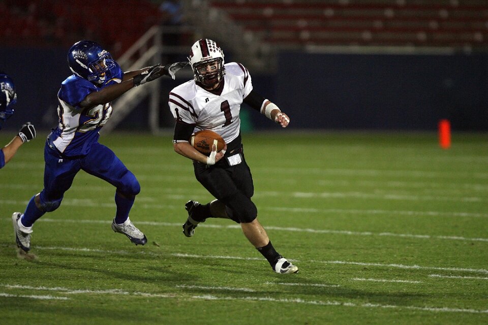 Quarterback ball carrier running back