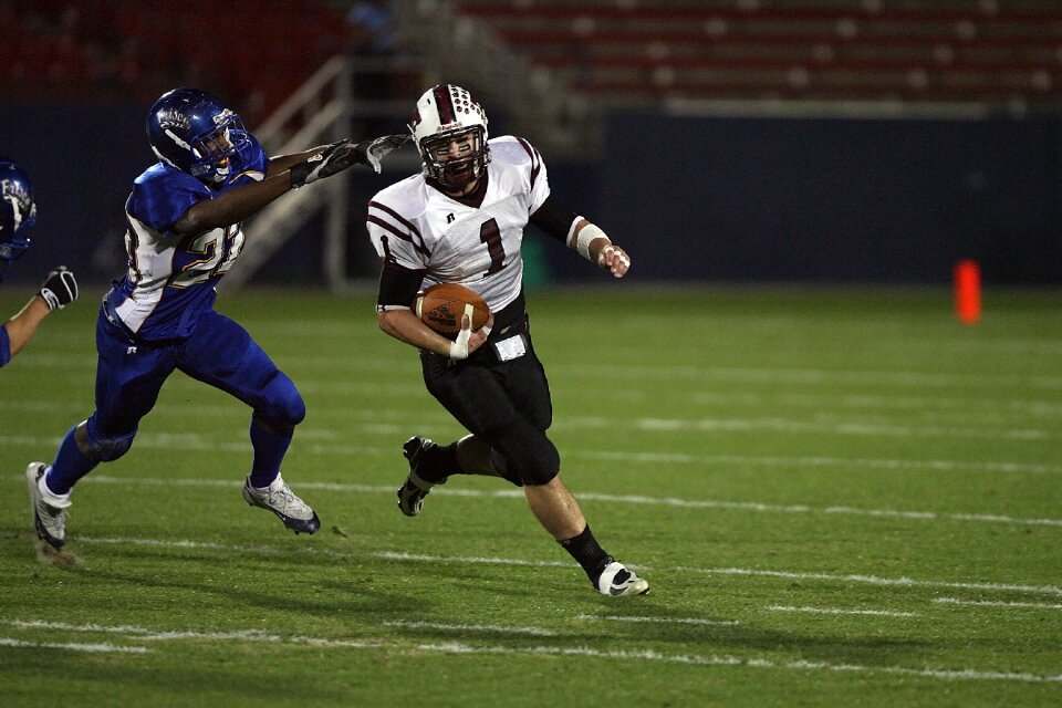 Quarterback ball carrier running back photo