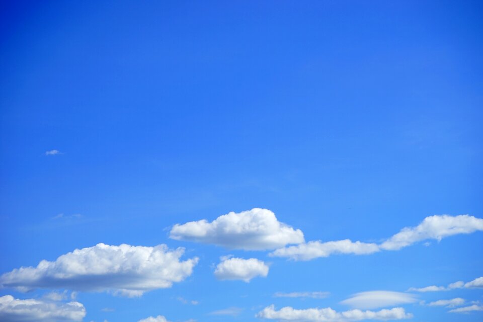 Blue white clouds form photo