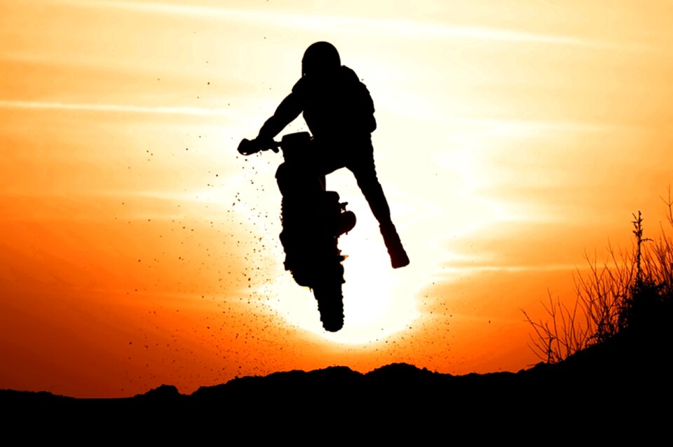 Sunset biker silhouette