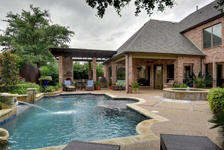 Swimming backyard patio family