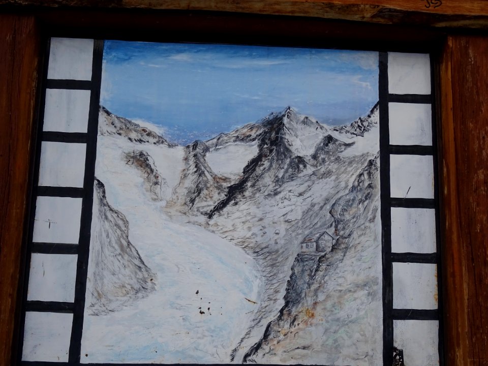 Décor peint sur la porte du refuge du Glacier Blanc 