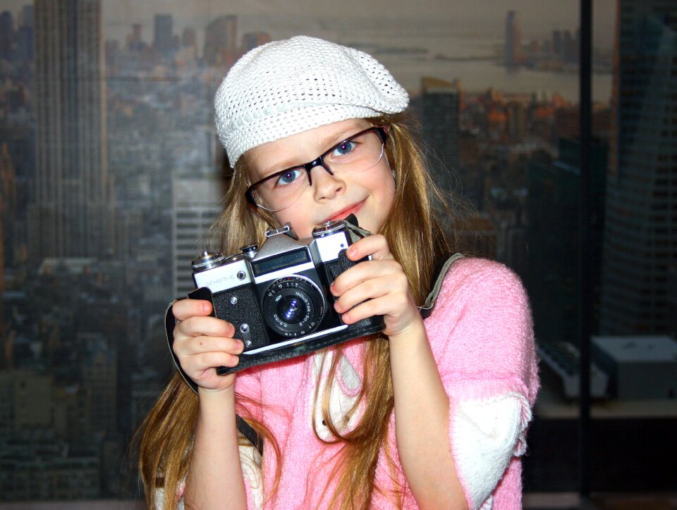 View smiling girl children photographer