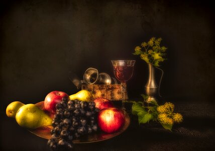 Apples grapes glass of wine photo