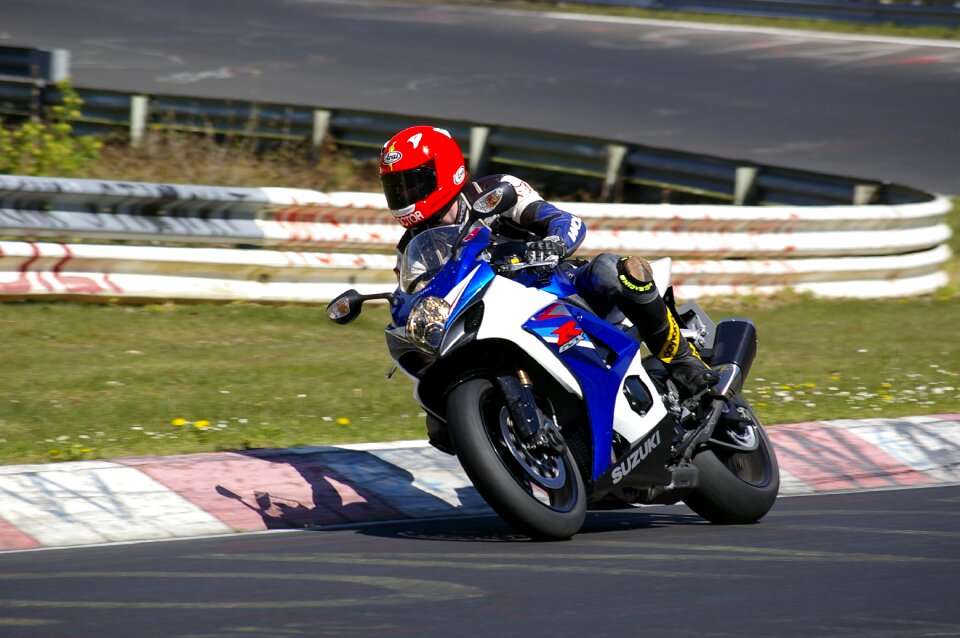Two wheeled vehicle motorcyclist suzuki