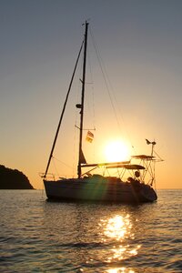 Yacht sun sunset photo
