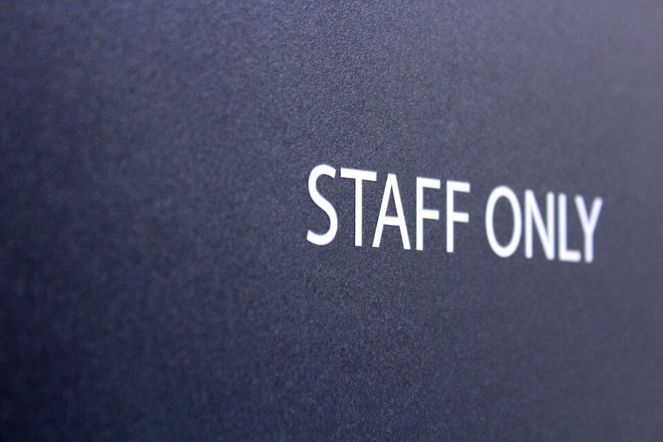 Sign wall only staff
