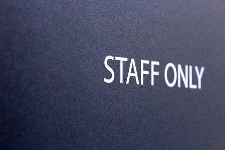 Sign wall only staff