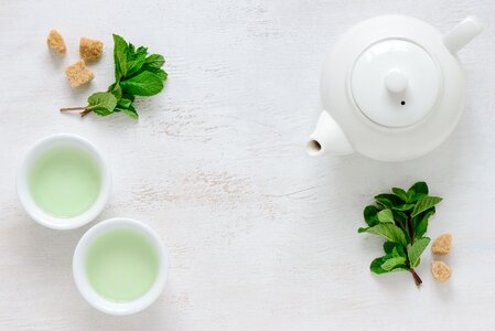 Green tea leaf teacup photo
