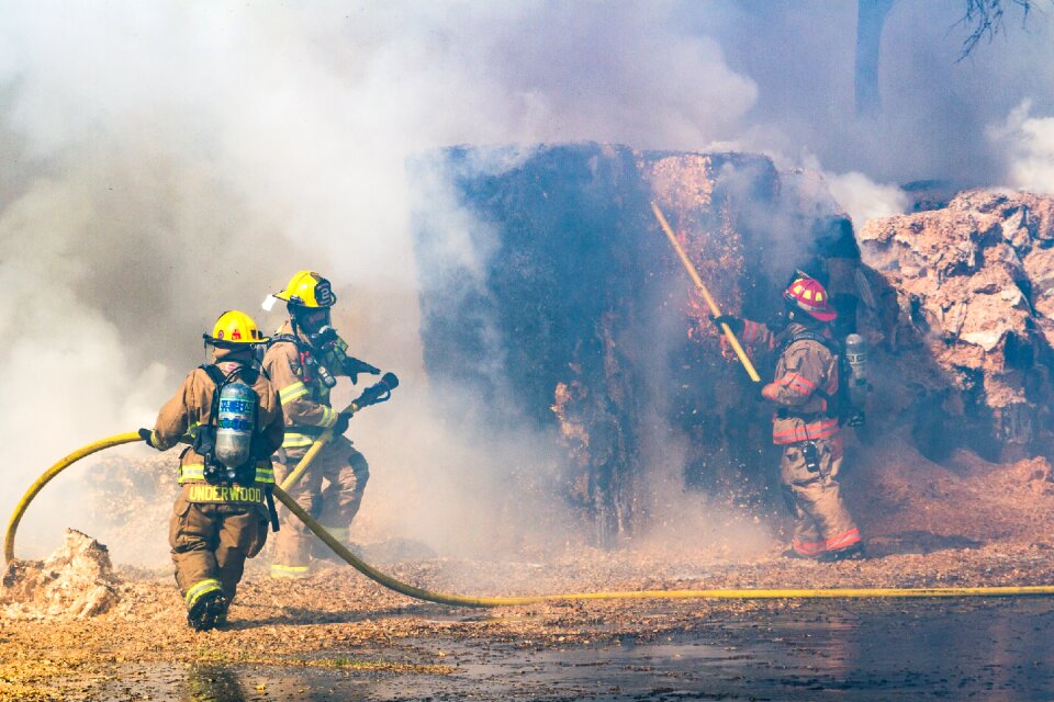Firefighters fire hose tractor supply