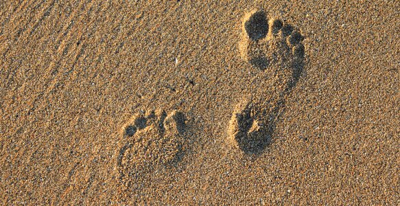 Barefoot feet sand photo