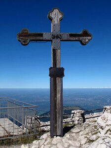 Cross alpine mountains photo