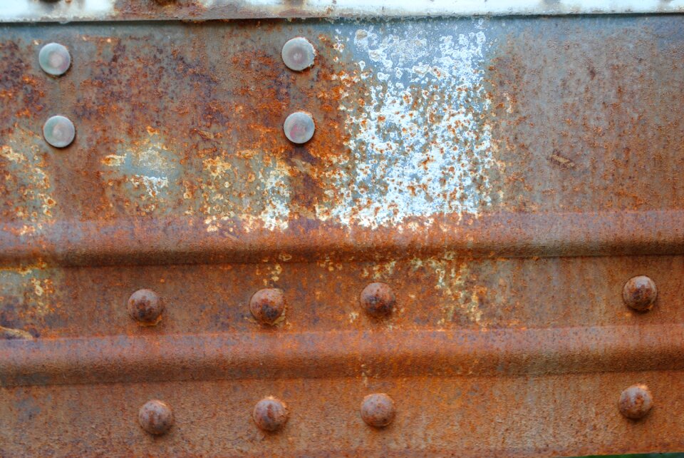 Blue peeling paint bolts