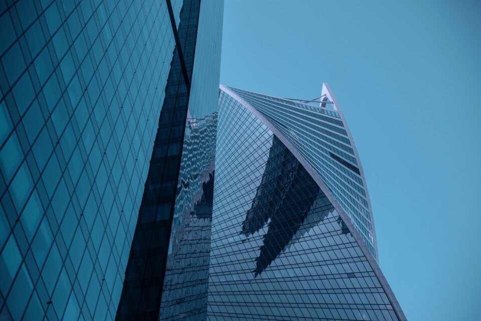 Business multistory building dark blue sky