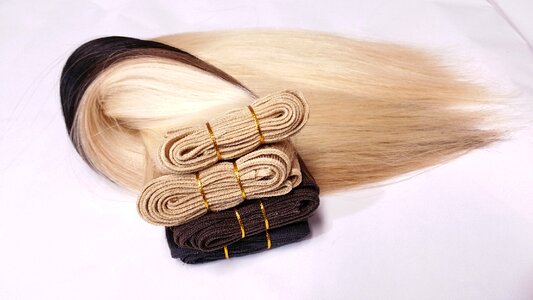 Weft extension hair extension photo