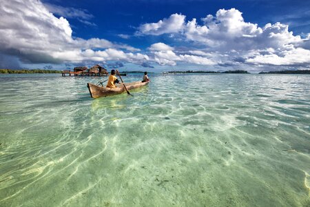 Canoe water ocean photo