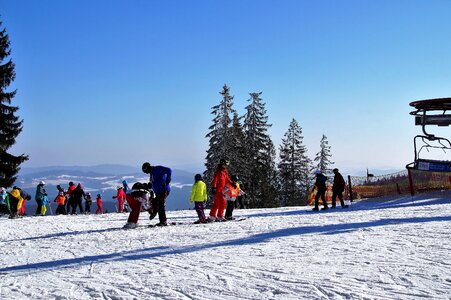 Snow skiers skiing