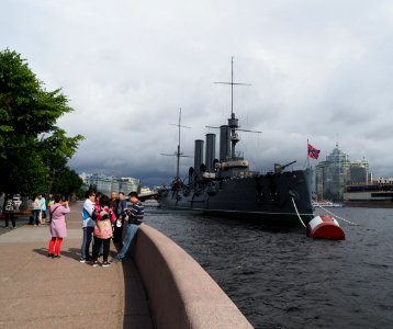 Chinese tourists enjoy russian ships photo