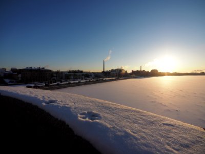 Sun, snow and two footsteps 