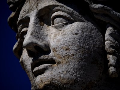 Old sculpture of young lady 