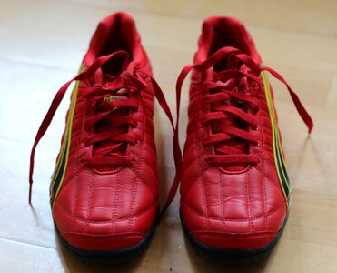 Sneaker soccer shoes red boots photo