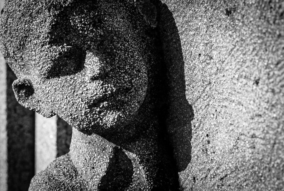 Grave cemetery statue