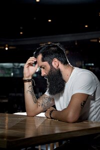 Bearded man tattoos skin