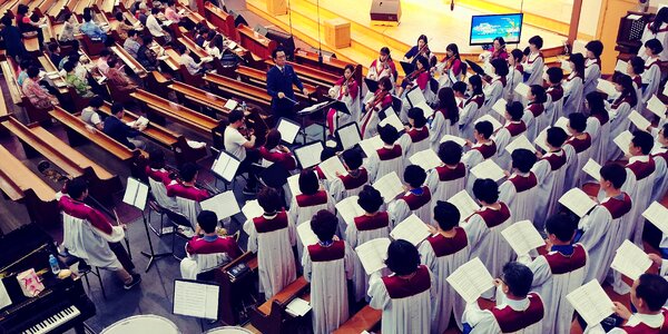 Praise conducting worship